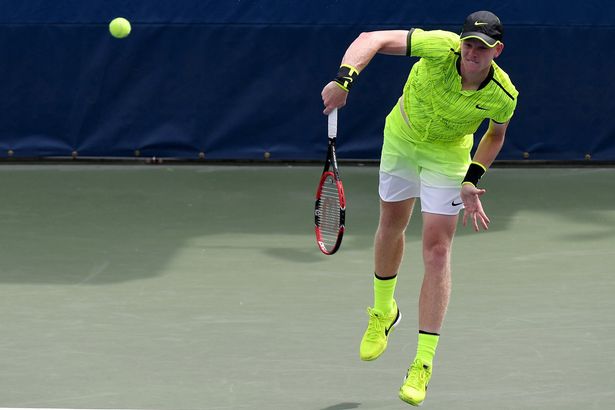 Kyle Edmund of Great Britain serves to Ernesto Escobedo of the United States