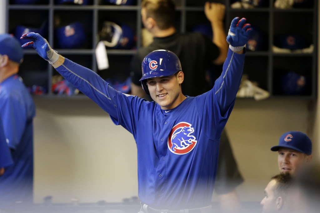 MILWAUKEE WI- SEPTEMBER 09 Anthony Rizzo #44 of the Chicago Cubs celebrates in the dugout after hitting a solo home run during the first inning against the Milwaukee Brewers at Miller Park