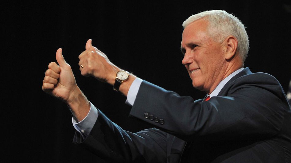 Mike Pence the Republican nominee for vice president gives two thumbs