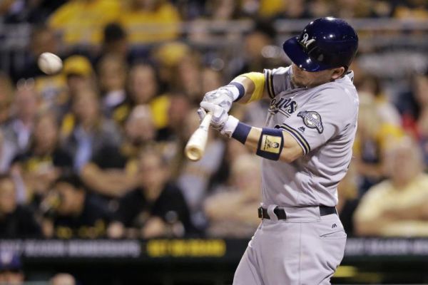 Milwaukee Brewers Scooter Gennett drives in a run