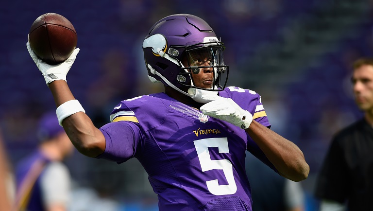 MINNEAPOLIS MN- AUGUST 28 Teddy Bridgewater #5 of the Minnesota Vikings warms up before the game against the San Diego Chargers