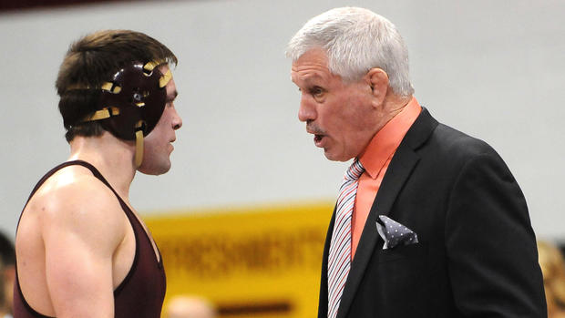 Minnesota fires longtime wrestling coach J Robinson