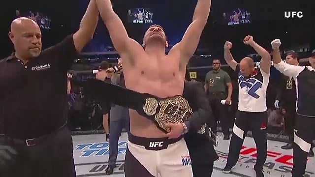 Miocic wins championship belt