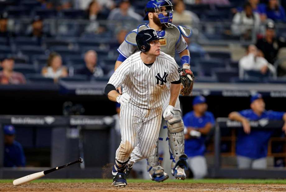 New York Yankees Chase Headley watches his two-run home run in front of Toronto Blue Jays catcher Russell Martin during the eighth inning of a baseball game on Tuesday Sept. 6 2016 in New York. ORG XMIT NYY118