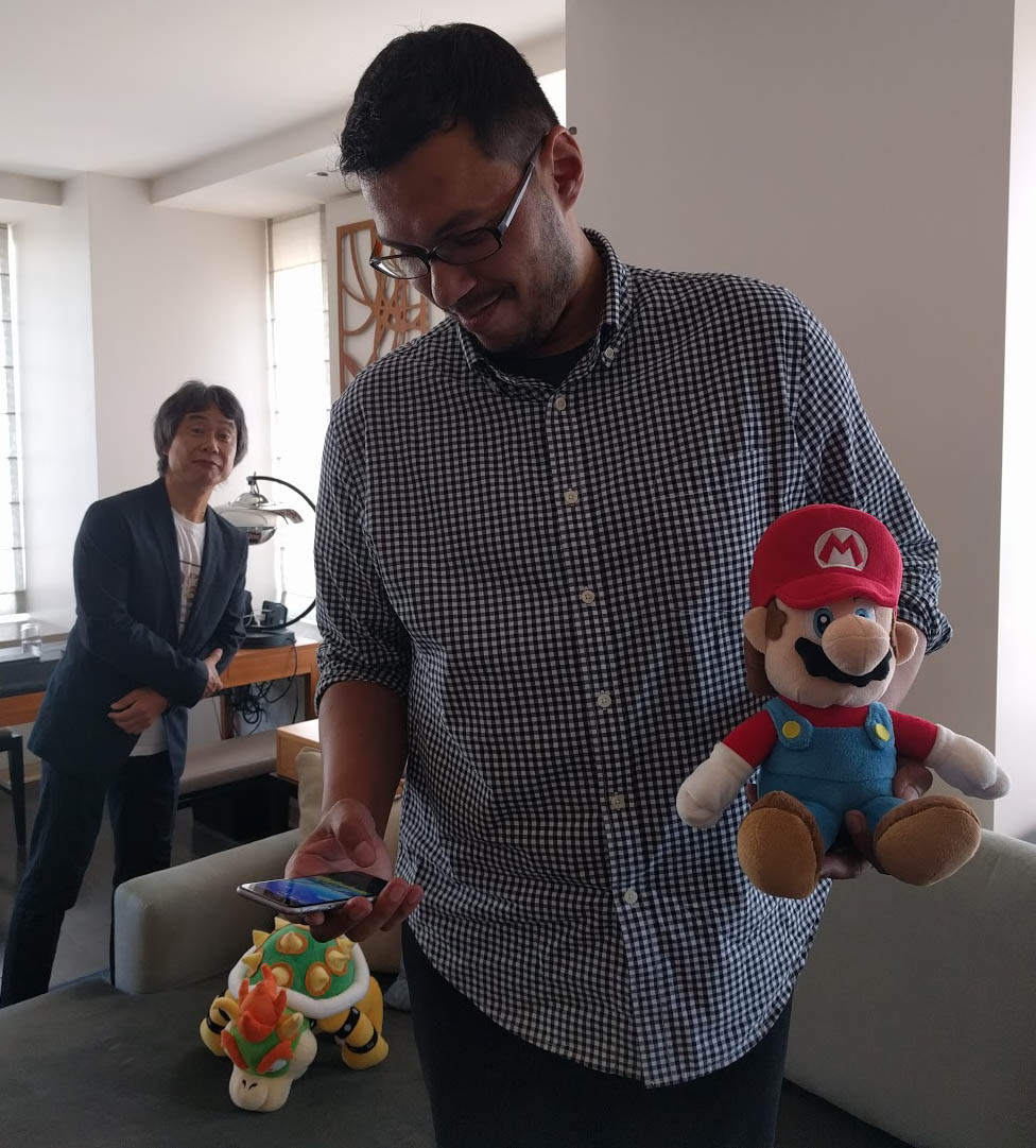 Miyamoto looks on from the distance as I played Super Mario Run with a plushie in the other hand