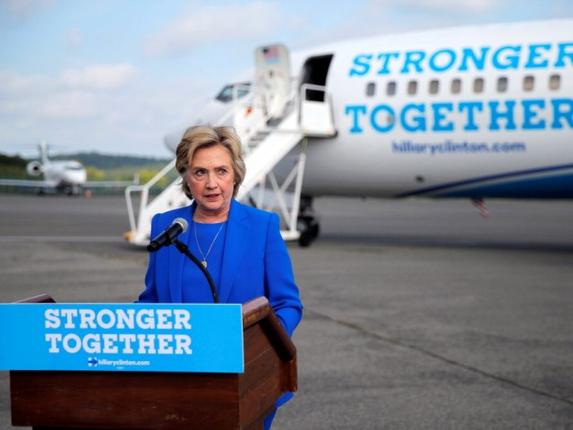 U.S. Democratic presidential candidate Hillary Clinton holds a news conference on the airport tarmac in front of her campaign plane in White Plains New York United States