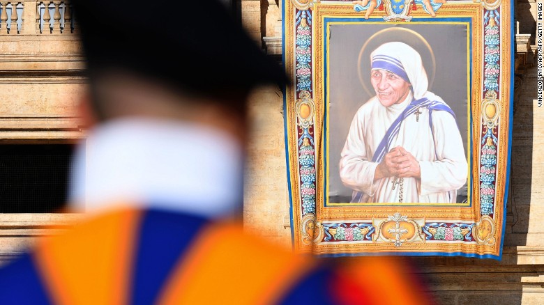 An image of Mother Teresa hangs from the facade of St. Peter's in the Vatican