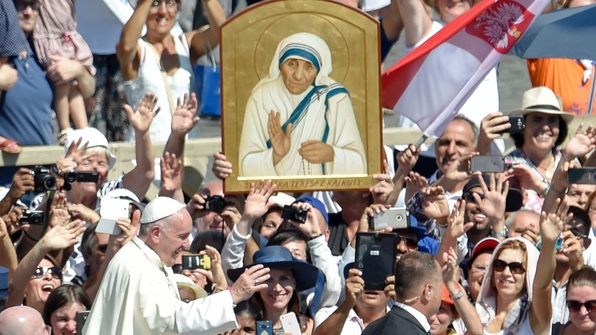 Mother Teresa honored as saint and model of mercy