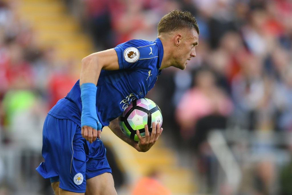 LIVERPOOL ENGLAND- SEPTEMBER 10 Jamie Vardy of Leicester City grabs the ball after scoring his sides first goal during the Premier League match between Liverpool and Leicester City at Anfield