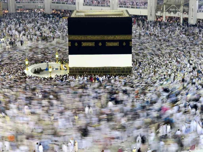 Muslim pilgrims circle the Kaaba at the Grand mosque in Mecca Saudi Arabia