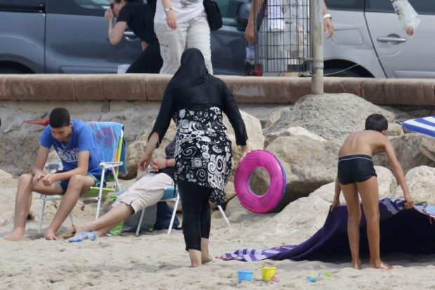 A woman in a burkini at a French beach. Reuters