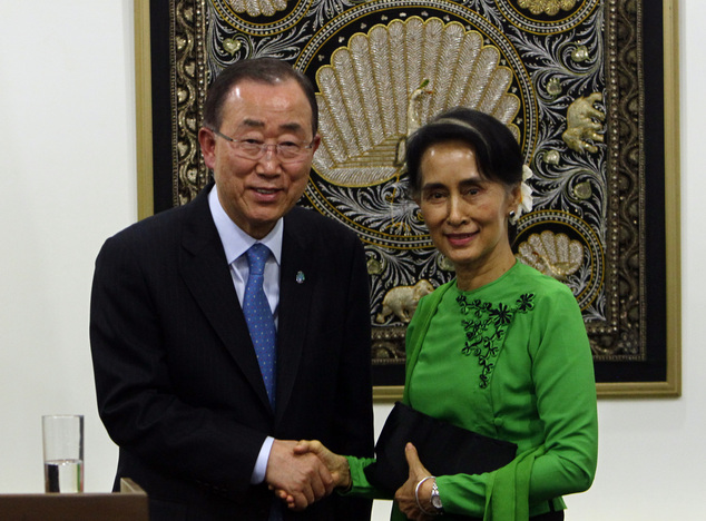 Myanmar Foreign Minister Aung San Suu Kyi right shakes hands with UN Secretary General Ban Ki-moon left after their press conference at the Foreign Min