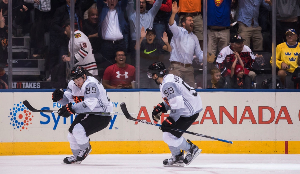 Team North America's Nathan MacKinnon left celebrates his game winning goal with teammate Shayne Gostisbehere against Sweden during overtime of a World Cup of Hockey game in Toronto on Wednesday Sept. 21 2016