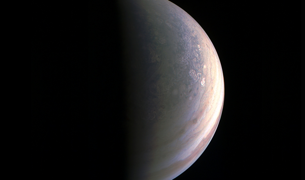 NASA's Juno spacecraft captured this view as it closed in on Jupiter's north pole