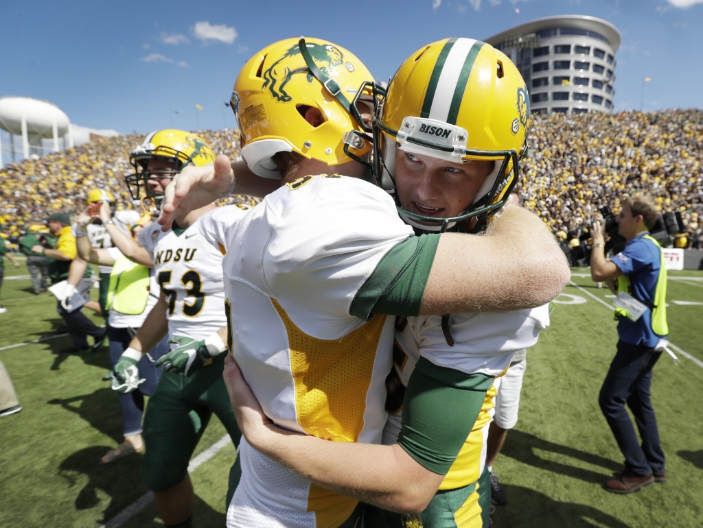 NDSU kicker Cam Pedersen right celebrates after kicking a 37-yard field goal on the final play