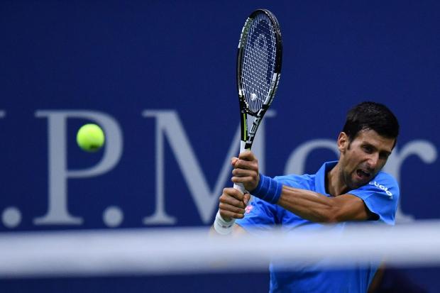 US Open begins with new roof, no rain in sight