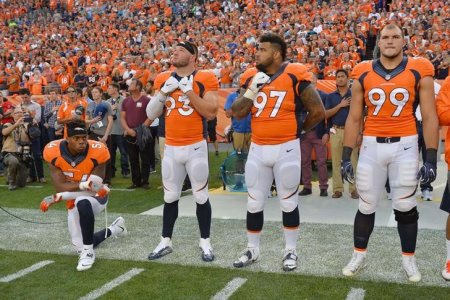 Sep 8 2016 Denver CO USA Denver Broncos inside linebacker Brandon Marshall kneels during the national anthem next to defensive end Jared Crick and defensive tackle Billy Winn and defensive tackle Adam Gotsis before the game agains