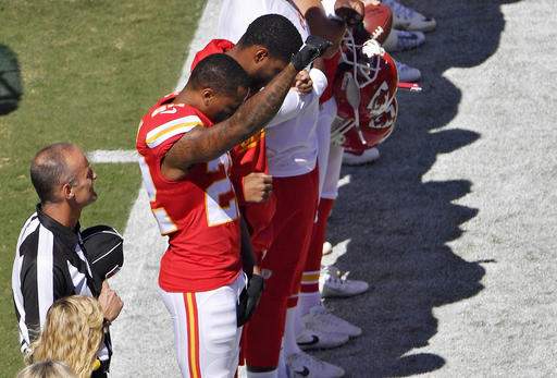 Marcus Peters raises fist during national anthem at Chiefs' NFL season opener