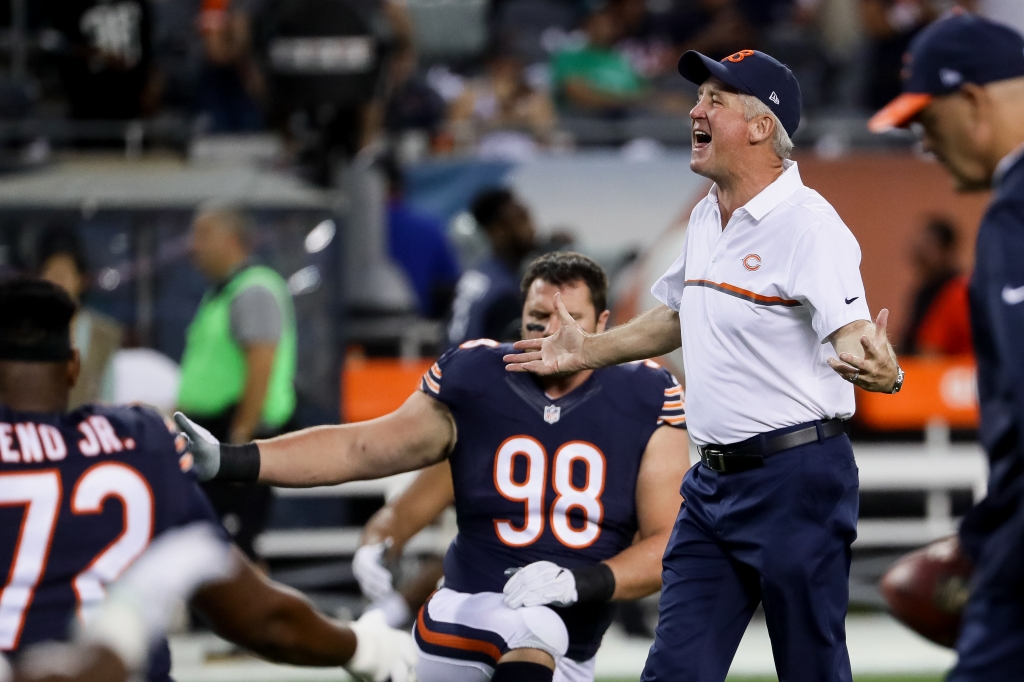 CHICAGO IL- SEPTEMBER 19 Head coach John Fox of the Chicago Bears encourages the team during warm-ups prior to the game against the Philadelphia Eagles at Soldier Field