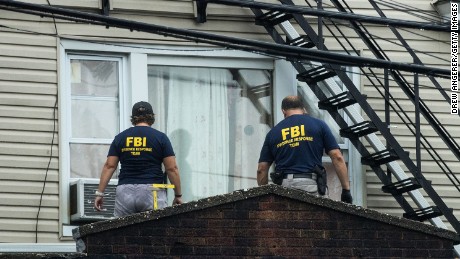 NY bombing suspect 'critical' as missing wife sought