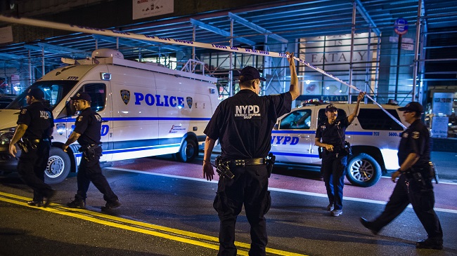 Police arrive on the scene of an explosion in Manhattan's Chelsea neighborhood in New York Saturday Sept. 17 2016. A law enforcement official tells The Associated Press that an explosion in the Chelsea neighborhood appears to have come from a con