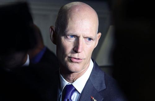 Florida Gov. Rick Scott speaks to the media after meeting with House Congressional members