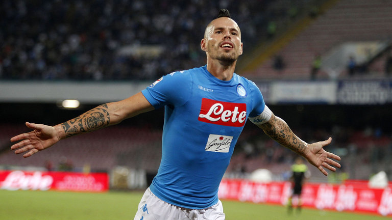 Napoli's Marek Hamsik celebrates scoring against Chievo