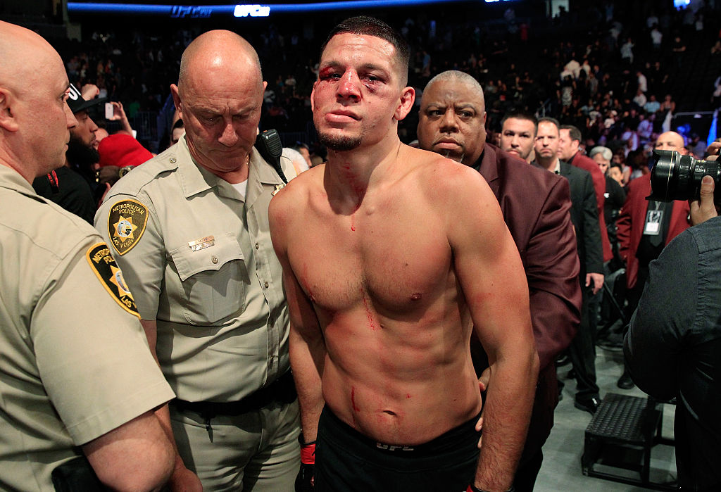 LAS VEGAS NV- AUGUST 20 Nate Diaz leaves the Octagon after his majority-decision loss to Conor Mc Gregor in their welterweight rematch at the UFC 202 event at T Mobile Arena