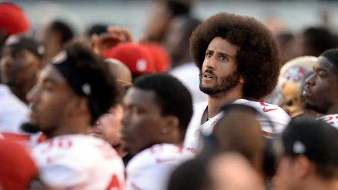 Colin Kaepernick looks on before the national anthem