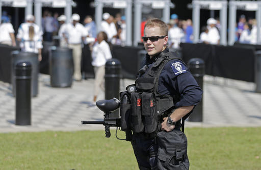 A Charlotte Mecklenburg Police officer stands guard outside Bank of America Stadium before an NFL football game between the Carolina Panthers and the Minnesota Vikings in Charlotte N.C. Sunday Sept. 25 2016. Increased secur