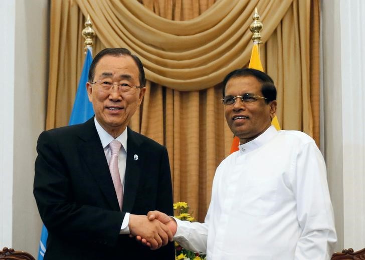 Secretary-General of the United Nations Ban Ki-moon shakes hands with Sri Lanka's President Maithripala Sirisena at their meeting during Ban's three-day official visit in Colombo Sri Lanka