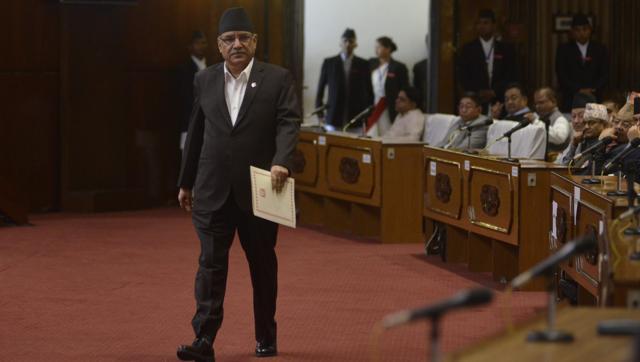 Nepalese Prime Minister Pushpa Kamal Dahal also known as Prachanda walks before addressing parliament in Kathmandu on September 8