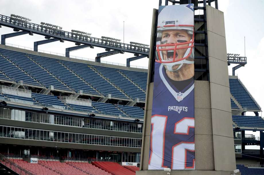 A oversized banner of New England Patriots Tom Brady is attached to the lighthouse at an entrance to Gillette Stadium Wednesday Sept. 7 2016 in Foxborough Mass