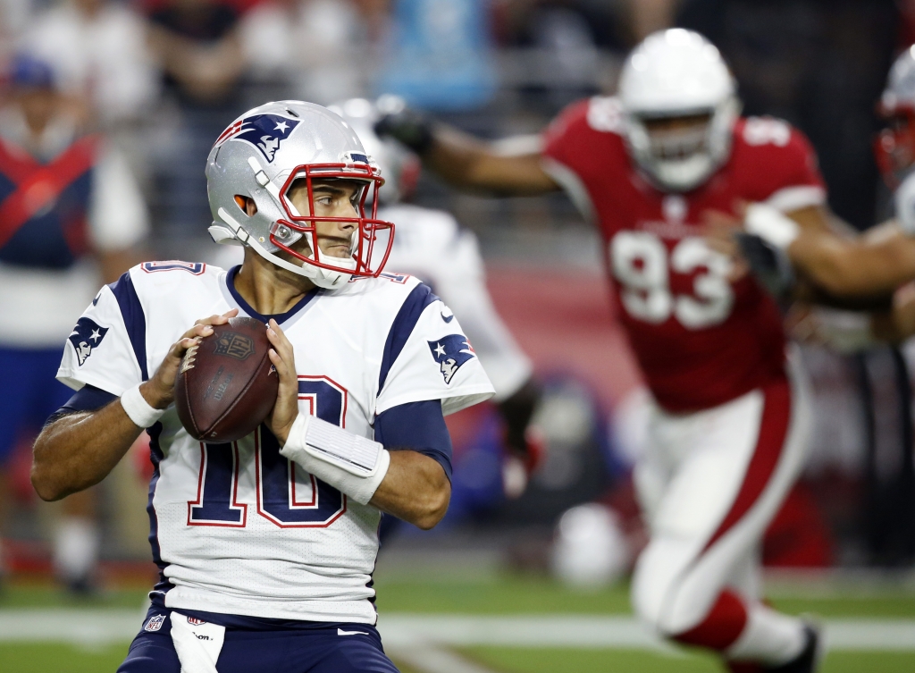 New England Patriots quarterback Jimmy Garoppolo looks to throw against the Arizona Cardinals during an NFL football game Sunday Sept. 11 2016 in Glendale Ariz