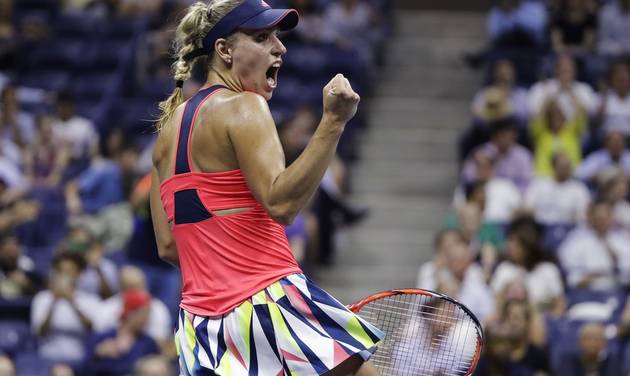 Angelique Kerber of Germany reacts after defeating Caroline Wozniacki of Denmark during the semifinals of the U.S. Open tennis tournament Thursday Sept. 8 2016 in New York