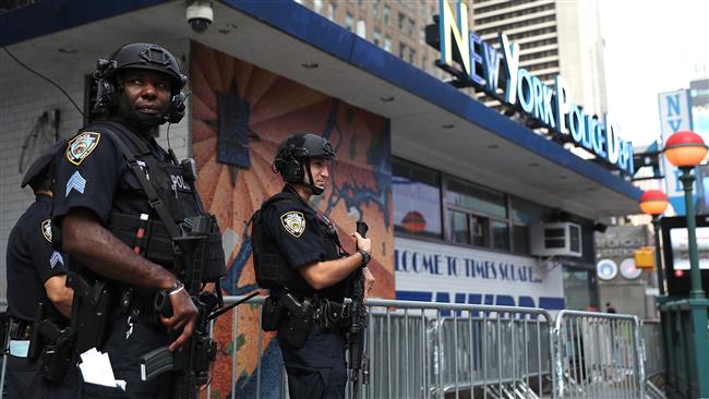 New York City police officers stand guard at Times Square