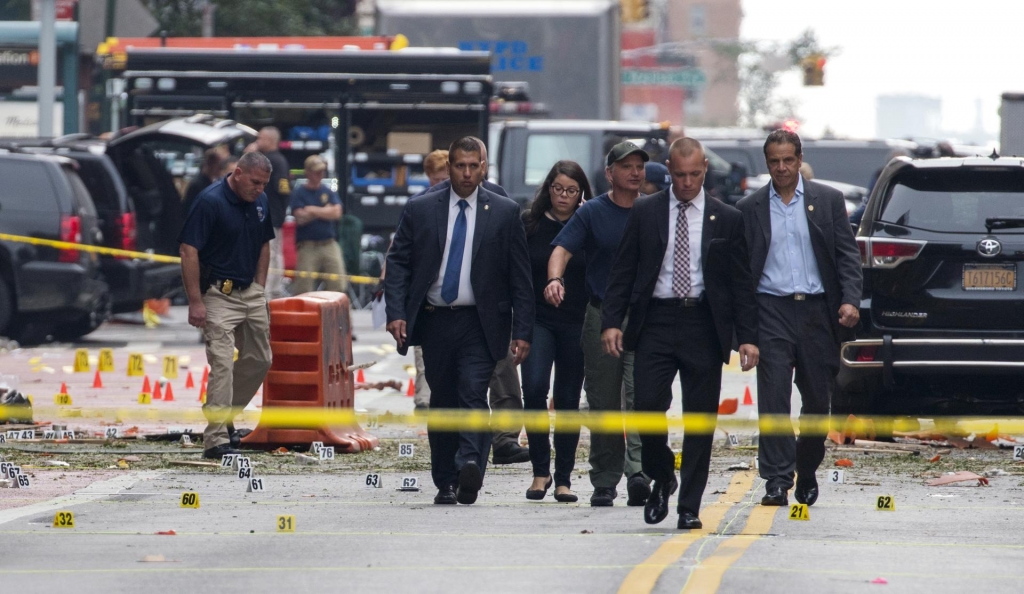 New York Gov. Andrew Cuomo right walked from the scene of the explosion Sunday morning