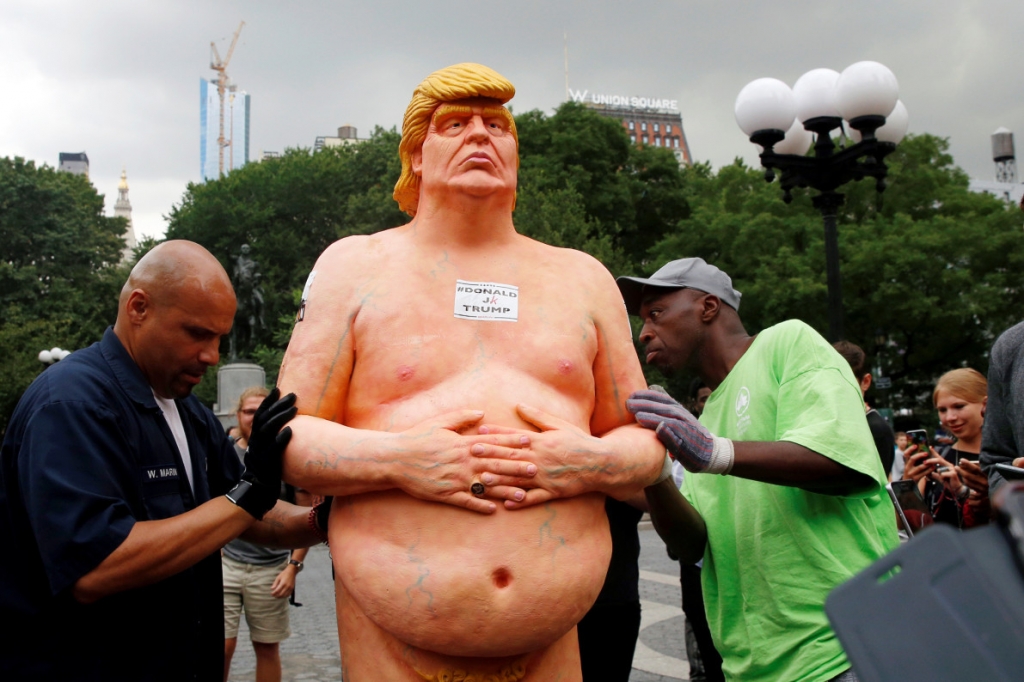 New York's Trump statue being removed. REUTERS  Brendan Mc Dermid — REUTERS