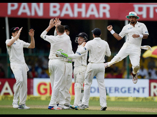 New Zealand players celebrating the wicket of India's Ajinkya Rahane during the first day of first test match at Green Park in Kanpur on Thursday