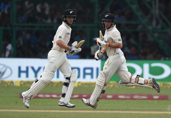 New Zealand's Tom Latham and captain Kane Williamson run between the wickets