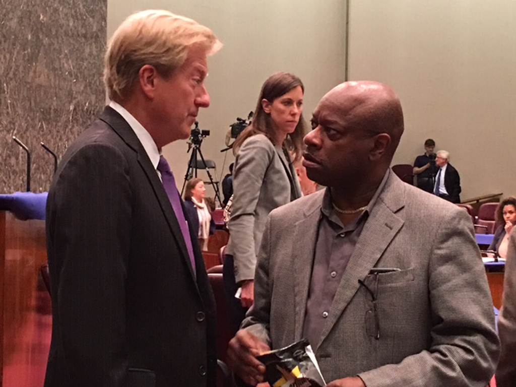 Corporation Counsel Steve Patton talks to Ald. Willie Cochran during a break at Tuesday's joint committee hearing on Mayor Rahm Emanuel's plan to abolish the Independent Police Review Authority and replace it with a new system of