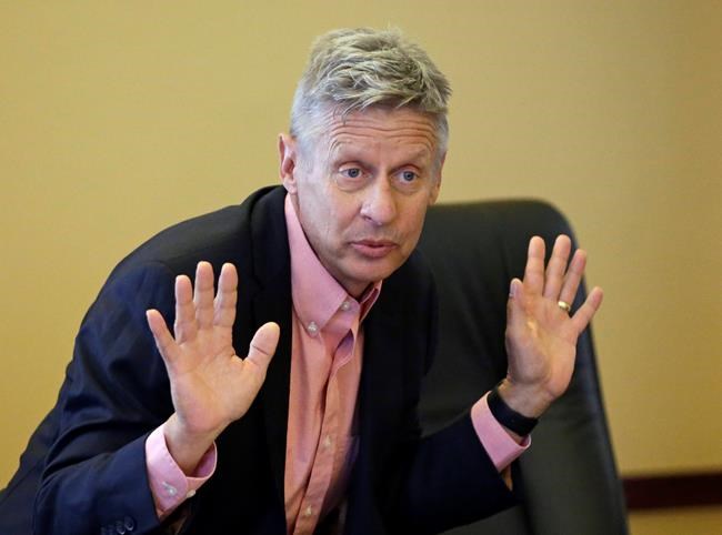 Libertarian presidential candidate former New Mexico Gov. Gary Johnson speak with legislators at the Utah State Capitol in Salt Lake City. If Hillary Clinton carries Arizona in November there‚Äôs a good chance