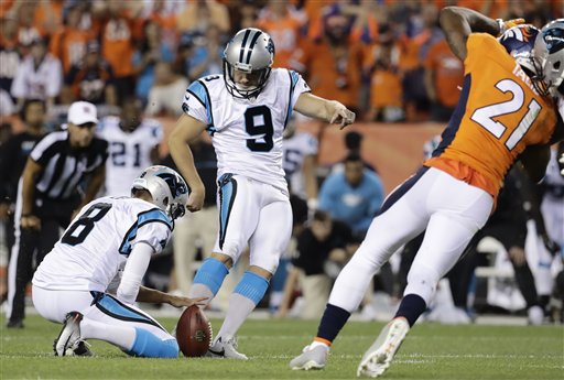 Carolina Panthers kicker Graham Gano misses a field goal attempt as punter Andy Lee holds during the second half of an NFL football game against the Denver Broncos Thursday Sept. 8 2016 in Denver. The Broncos won 21-20