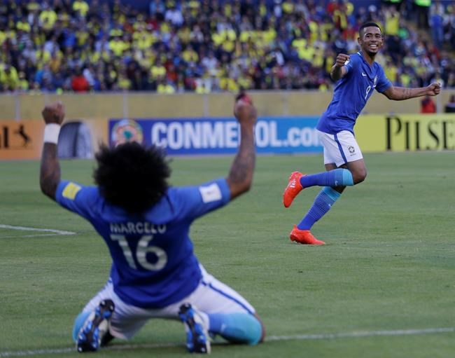 Brazil's Gabriel Jesus right celebrates scoring his side's second goal against Ecuador during a 2018 World Cup qualifying soccer match at the Atahualpa stadium in Quito Ecuador Thursday Sept. 1 2016. Back to camera is Brazil's Marcelo