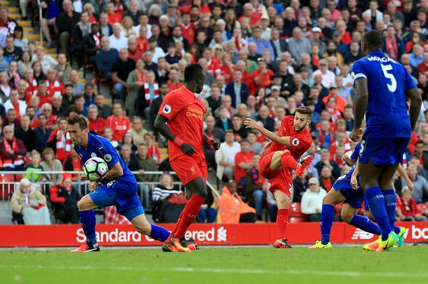 Liverpool's Adam Lallana scores his side's third goal of the game