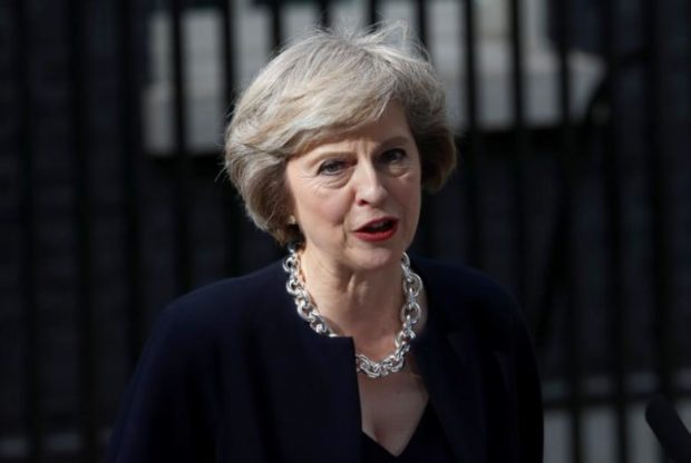 Theresa May speaks to the media outside number 10 Downing Street in central London Britain