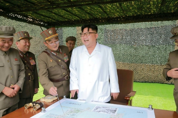 North Korea's dictator Kim Jong Un with a few of his military advisers