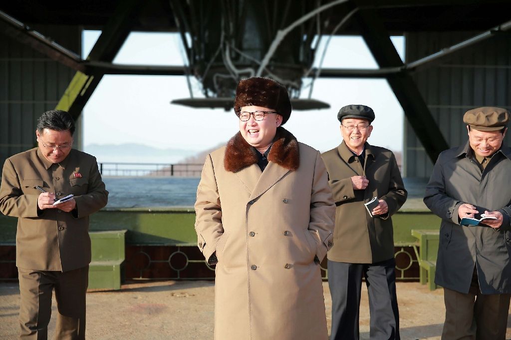 North Korean leader Kim Jong Un inspects the ground jet test of a new high-powered inter-continental ballistic rocket engine at the Sohae Space Center in North Pyongan Province in April 2016. AFP File