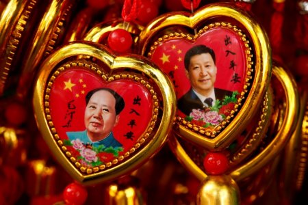 Souvenirs featuring portraits of China's late Chairman Mao Zedong and China's President Xi Jinping are seen at a shop near the Forbidden City in Beijing China