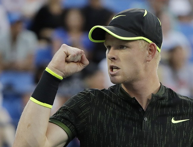 Edmund sets up Djokovic clash in last 16